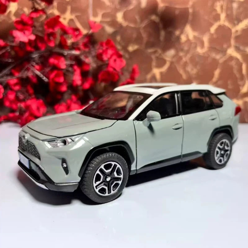 Toyota RAV4 – Miniatura 1:32 com Luzes e Sons